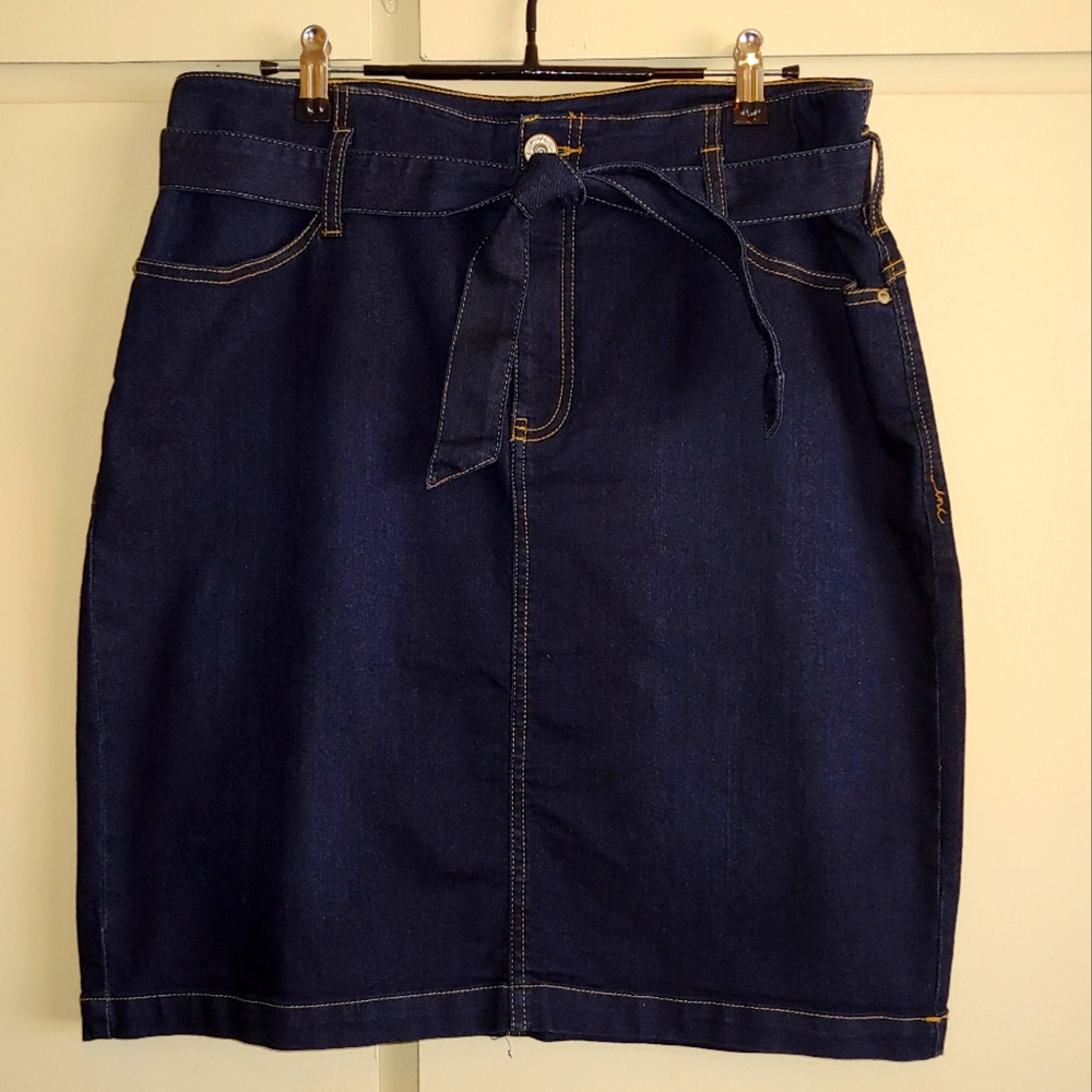 Denim skirt, dark wash with tie belt.